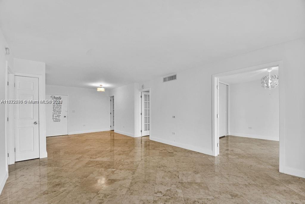 5555 Collins Avenue, Unit 5V Miami Beach, FL 33140 - Photo 21 of 46 a view of an empty room