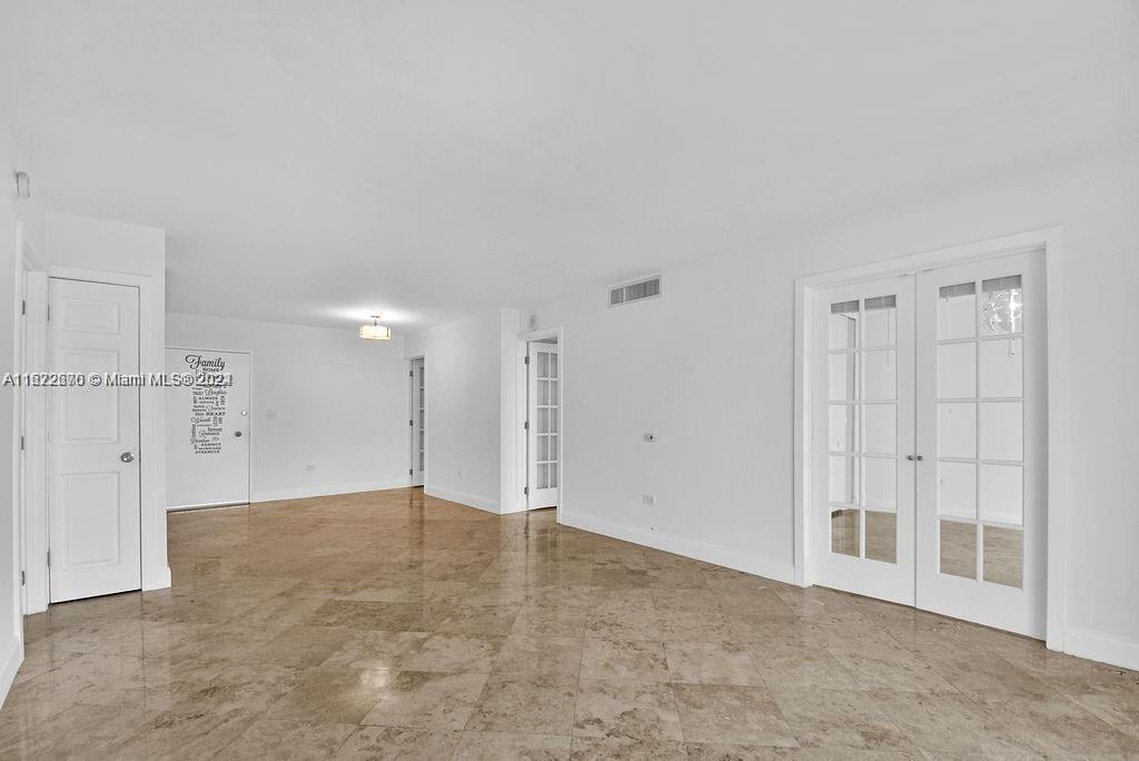 5555 Collins Avenue, Unit 5V Miami Beach, FL 33140 - Photo 22 of 46 a view of an empty room