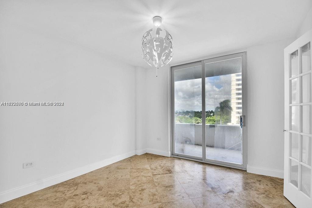 5555 Collins Avenue, Unit 5V Miami Beach, FL 33140 - Photo 23 of 46 a view of empty room with window