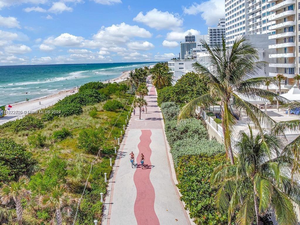 5555 Collins Avenue, Unit 5V Miami Beach, FL 33140 - Photo 30 of 46 a view of a yard with an outdoor space