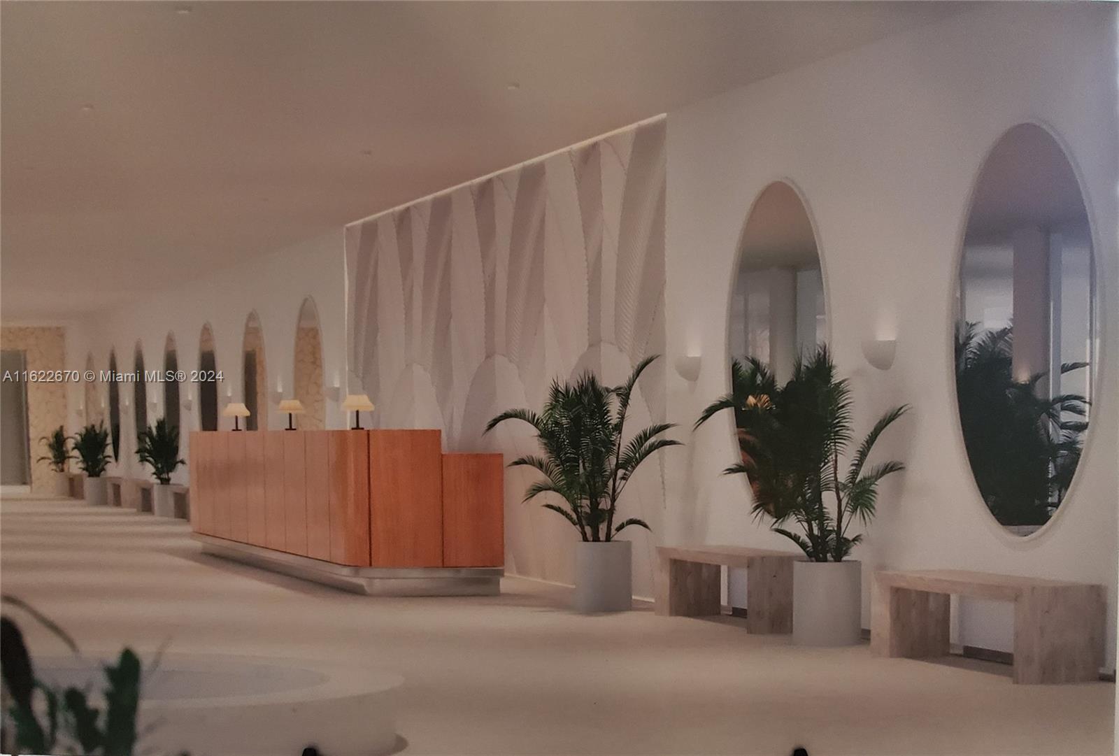 5555 Collins Avenue, Unit 5V Miami Beach, FL 33140 - Photo 41 of 46 a potted plant sitting on top of a kitchen counter