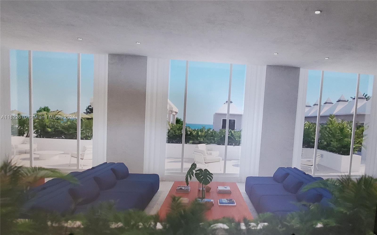 5555 Collins Avenue, Unit 5V Miami Beach, FL 33140 - Photo 43 of 46 a living room with furniture