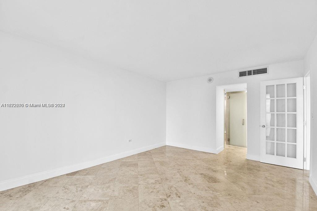 5555 Collins Avenue, Unit 5V Miami Beach, FL 33140 - Photo 6 of 46 a view of an empty room