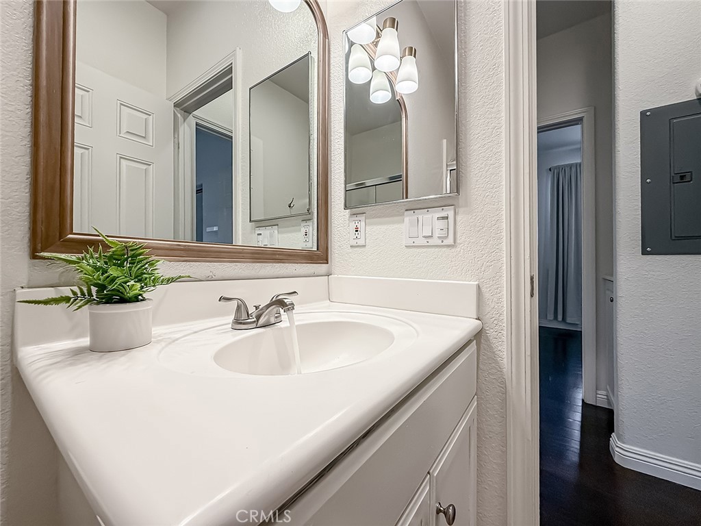 6834 Simmons Way Moorpark, CA 93021 - Photo 23 of 40 a bathroom with a sink and a mirror