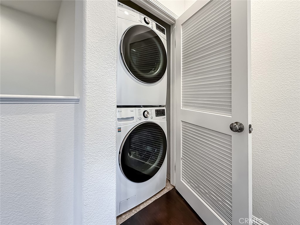 6834 Simmons Way Moorpark, CA 93021 - Photo 25 of 40 a utility room with dryer and washer