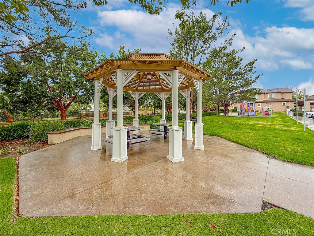 6834 Simmons Way Moorpark, CA 93021 - Photo 37 of 40 a view of a building with a yard