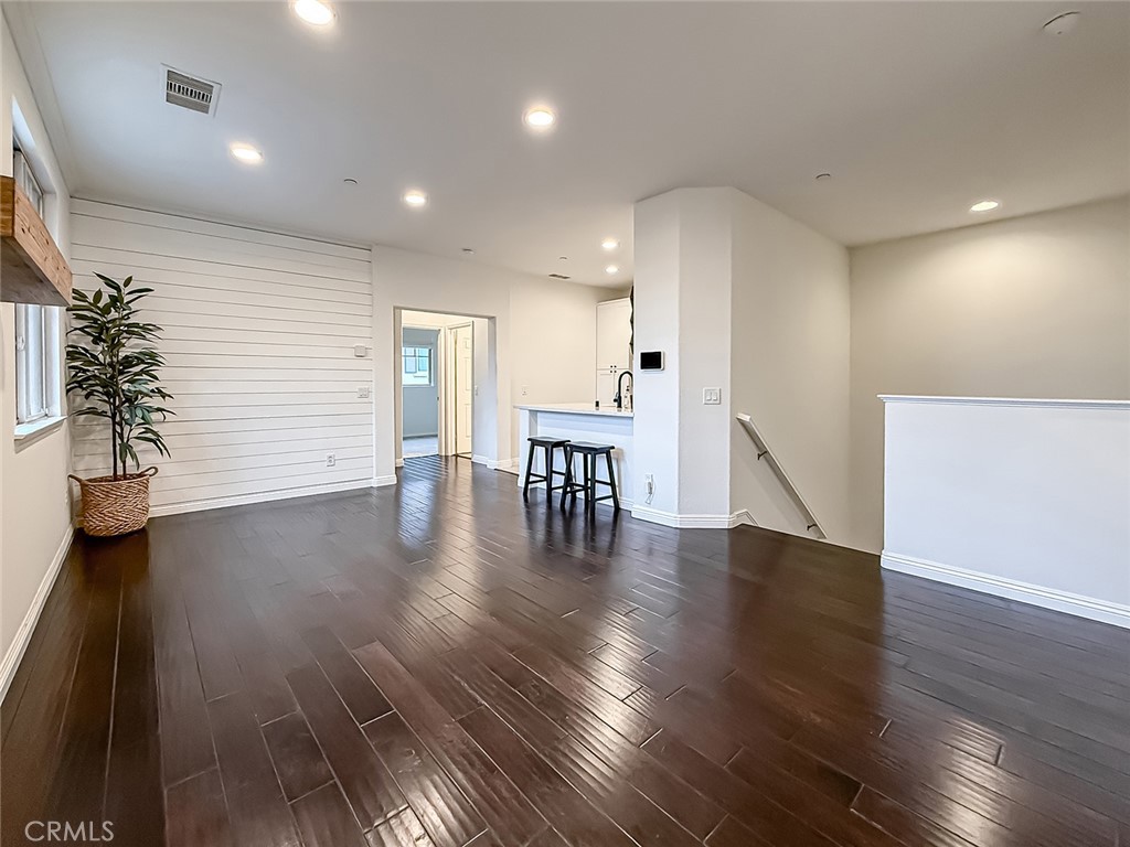 6834 Simmons Way Moorpark, CA 93021 - Photo 7 of 40 a view of a room with wooden floor
