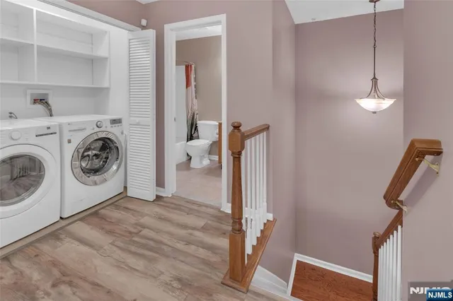a view of a storage & utility room with utility room