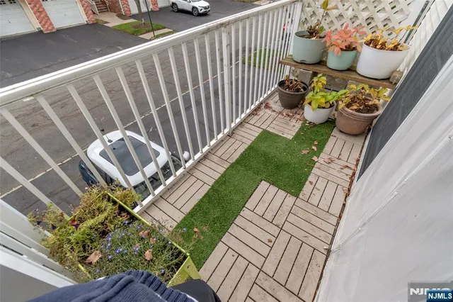 a view of a backyard with sitting area