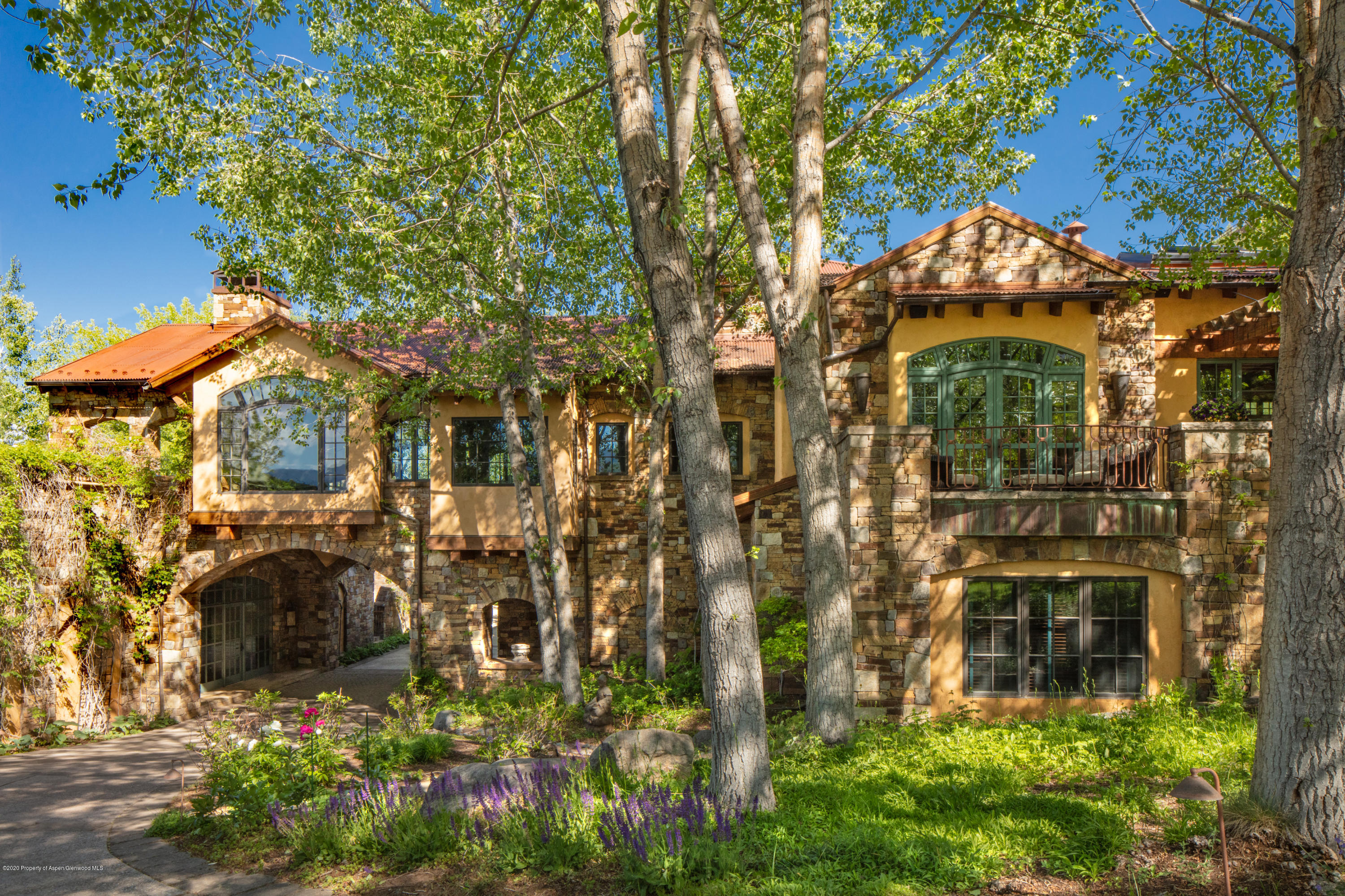 835 Red Mountain Road Aspen, CO 81612 - Photo 1 of 24 a view of a multi story building