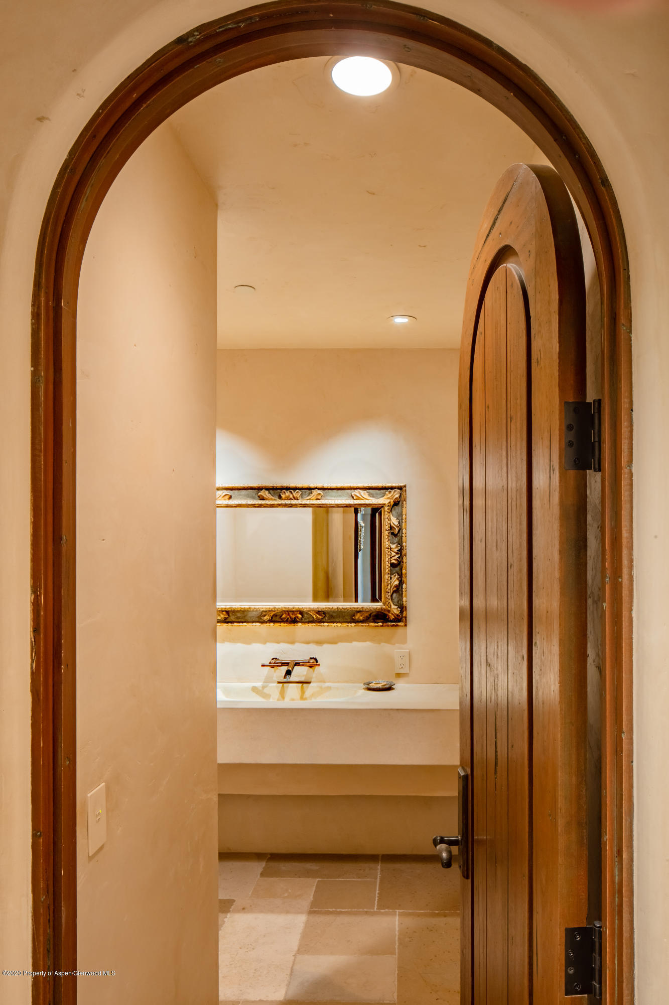 835 Red Mountain Road Aspen, CO 81612 - Photo 15 of 24 a bathroom with a sink and a mirror