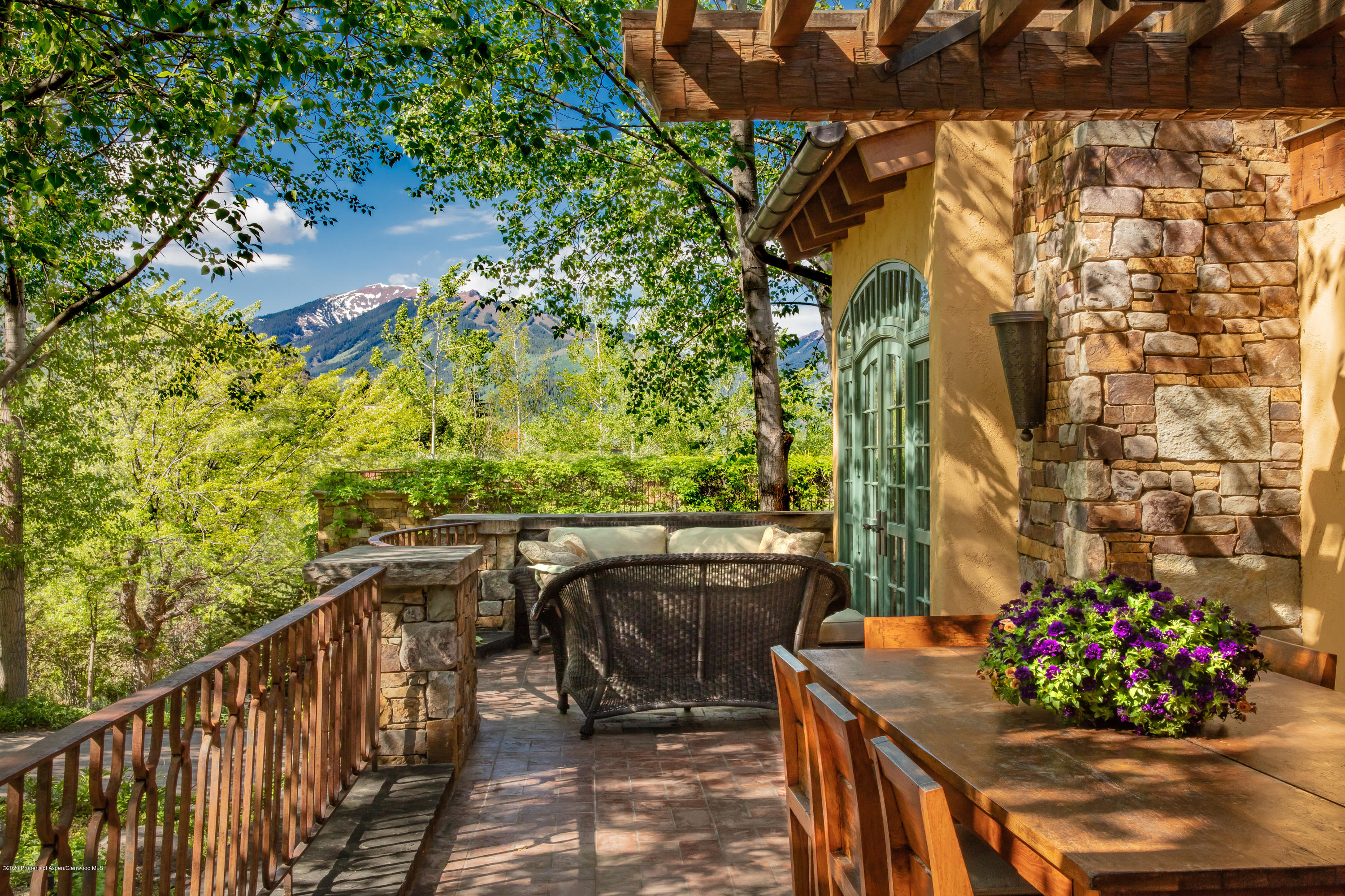 835 Red Mountain Road Aspen, CO 81612 - Photo 3 of 24 a view of two chairs and table in the balcony