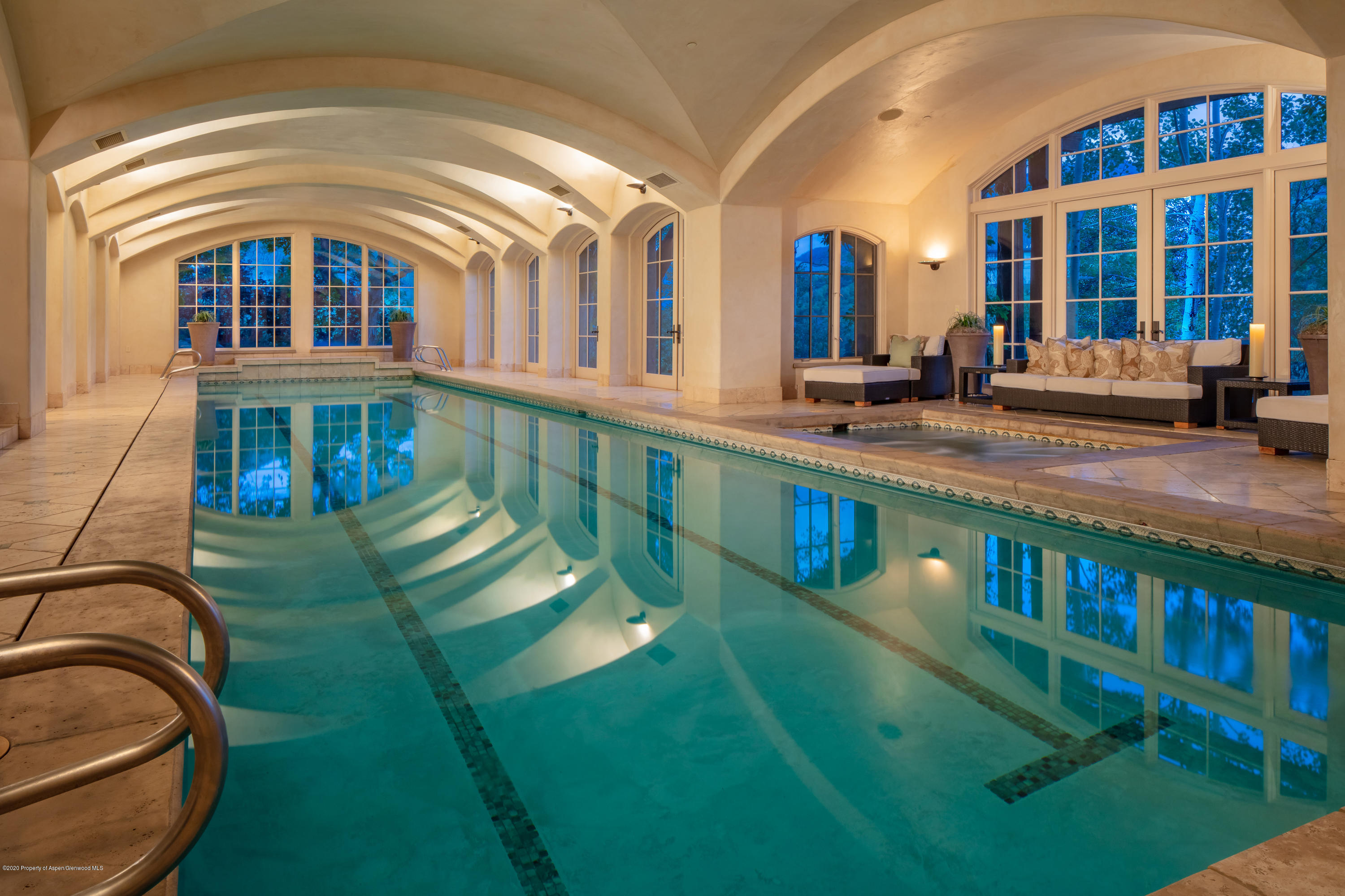 835 Red Mountain Road Aspen, CO 81612 - Photo 6 of 24 a view of front door of house with a swimming pool