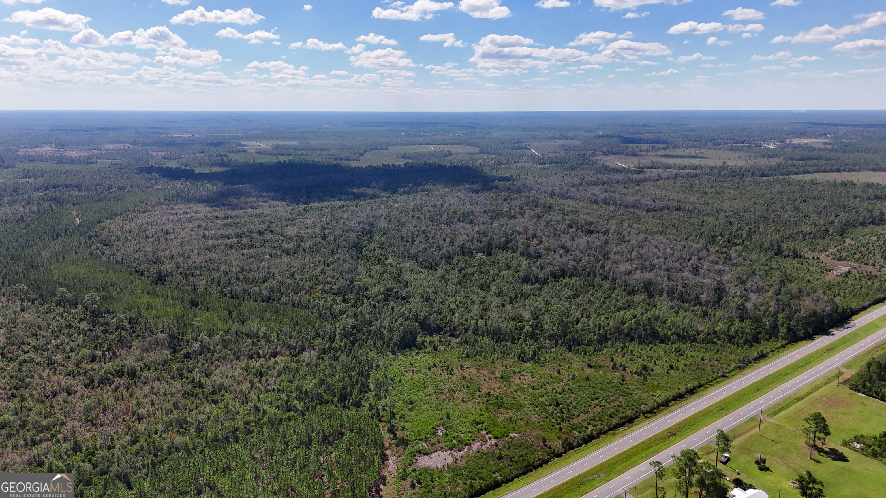 0 Highway 84, Unit 1 Homerville, GA 31634 - Photo 3 of 10 a view of a yard with an outdoor seating