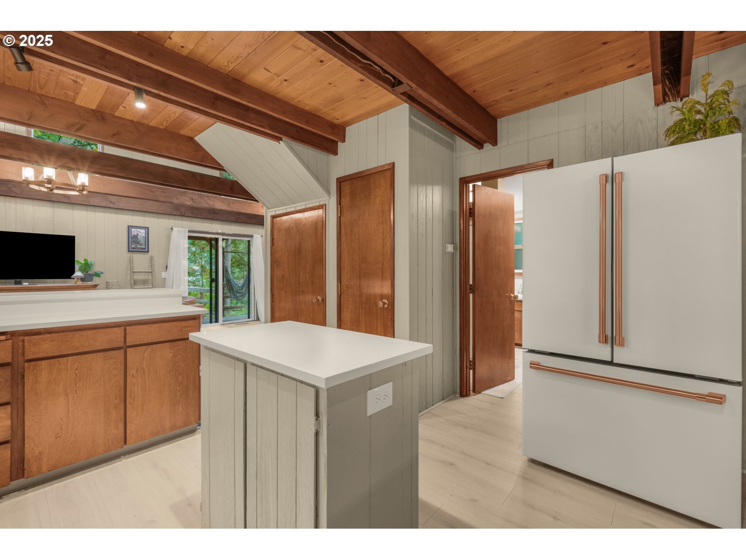 21760 East Tree Swallow Lane Rhododendron, OR 97049 - Photo 12 of 32 a kitchen that has a sink a refrigerator and a stove top oven