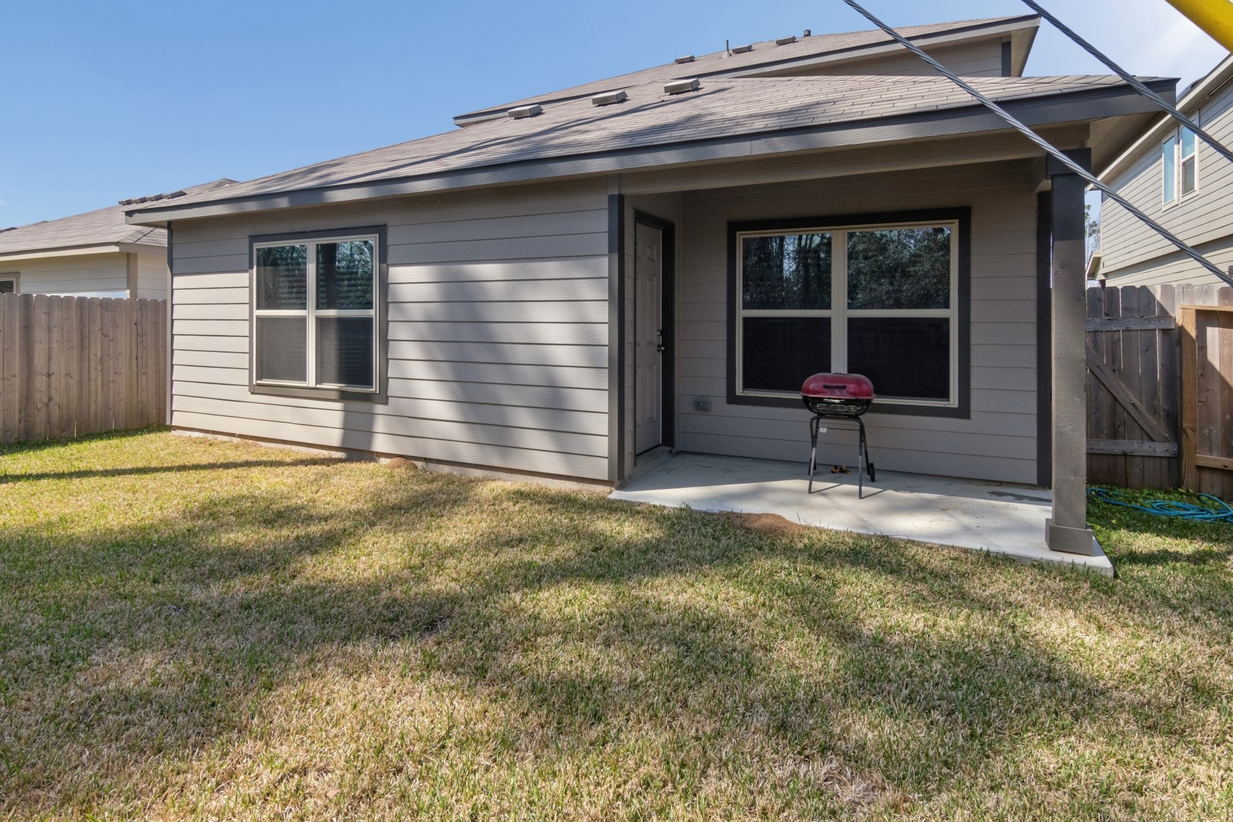 2250 Yelverton Ter Trail Spring, TX 77373 - Photo 29 of 30 a front view of a house with a yard