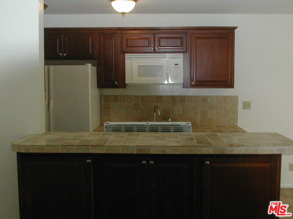 3745 Keystone Avenue, Unit 3 Los Angeles, CA 90034 - Photo 7 of 14 a view of kitchen with a sink