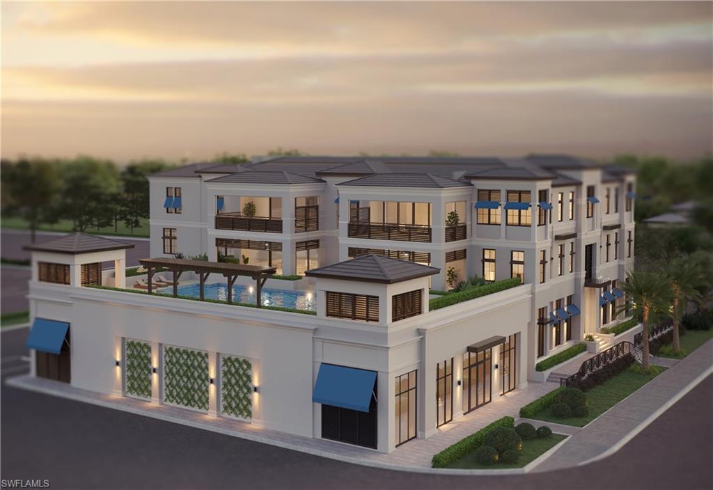 180 9th Street South, Unit 302 Naples, FL 34102 - Photo 5 of 7 a view of a large building with a street