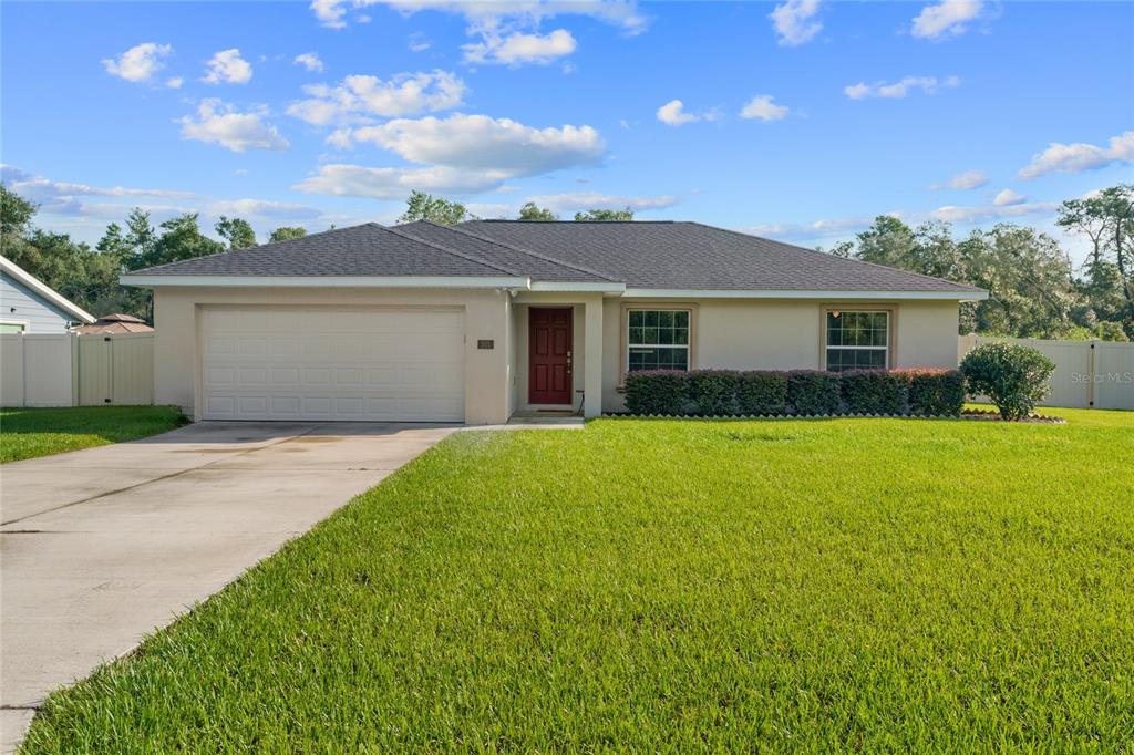 501 Marion Oaks Golf Road Ocala, FL 34473 - Photo 1 of 1 a view of outdoor space yard and front view of a house