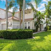 a view of a building with a yard