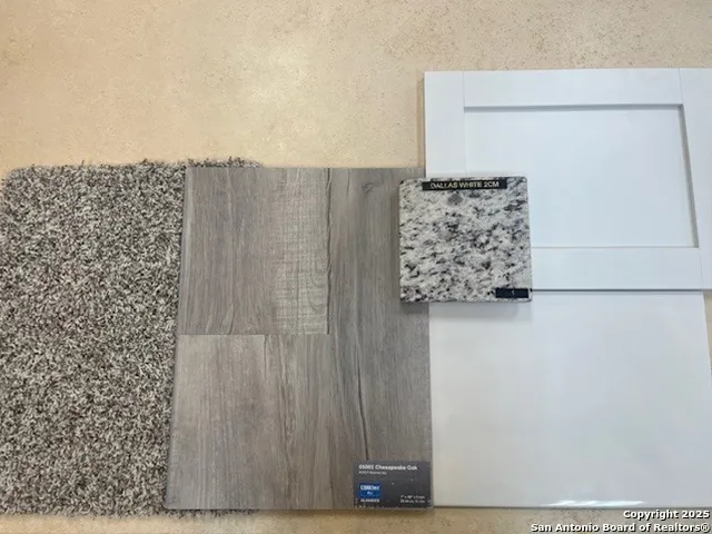 a kitchen with kitchen island white cabinets appliances and cabinets