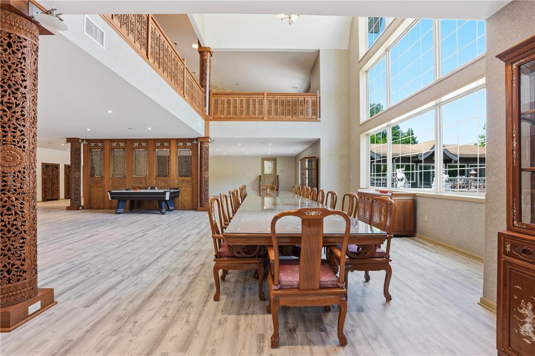 6271 Batman Road Zionsville, PA 18092 - Photo 12 of 100 Natural illumination fills this grand living space with vaulted ceilings and a sophisticated dining area.