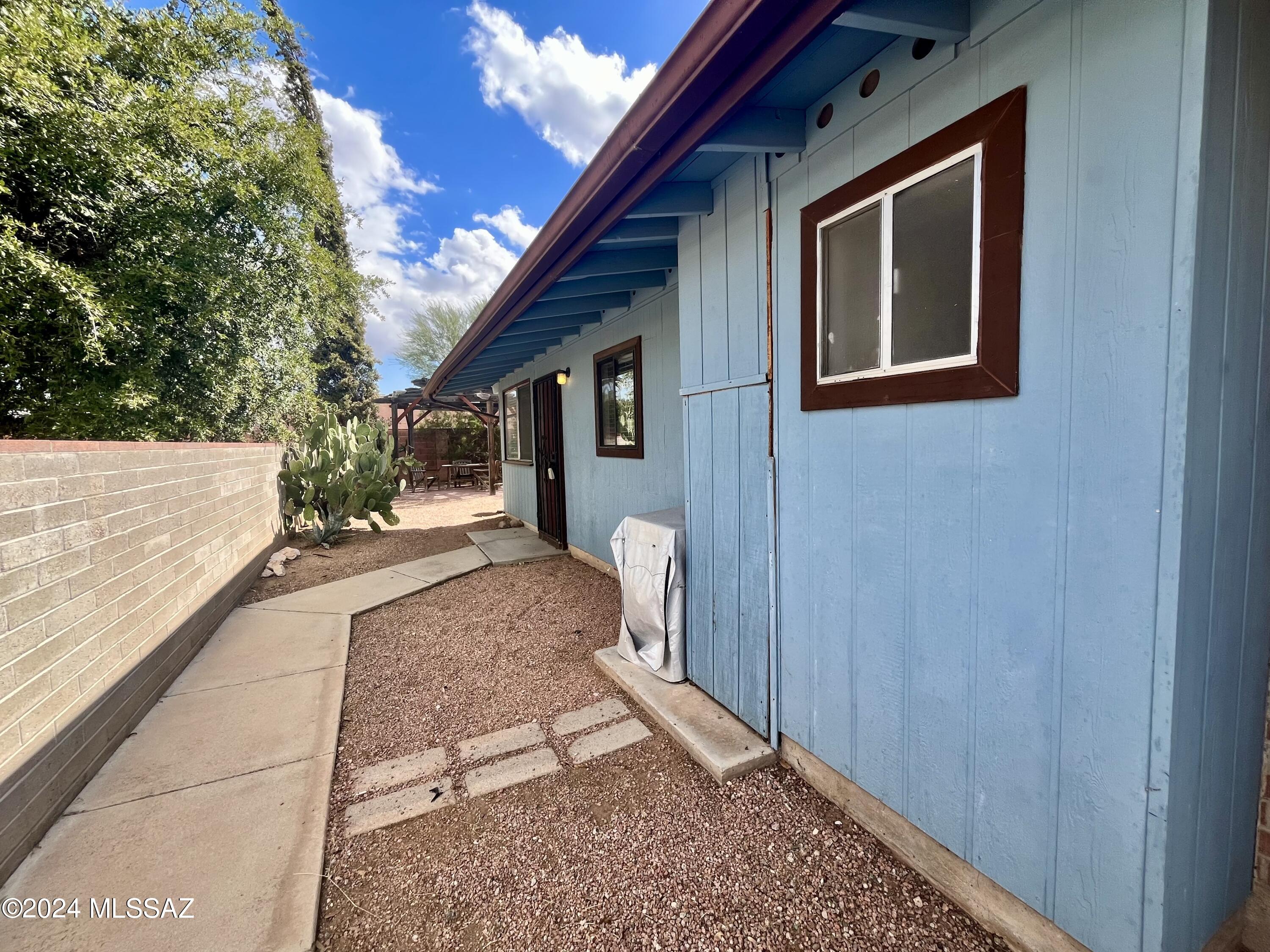 2118 North Rita Avenue Tucson, AZ 85716 - Photo 16 of 17 a view of a house with a yard