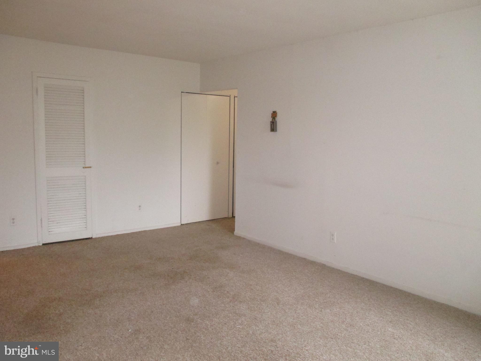 19317 Club House Road, Unit 302 Gaithersburg, MD 20886 - Photo 6 of 18 a view of an empty room