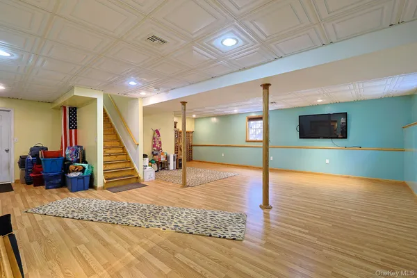 a view of a hall with stairs