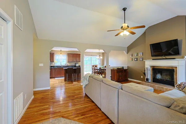 a view of a living room and a fireplace