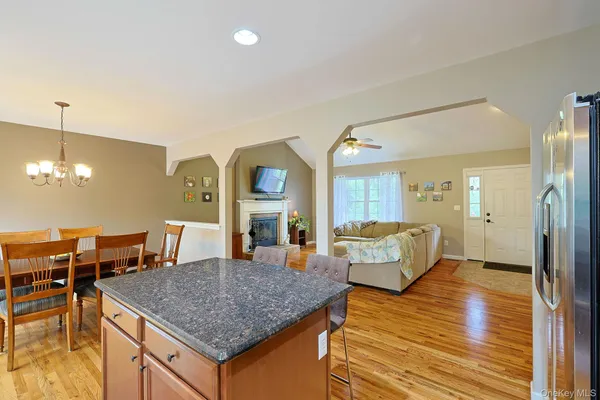 a kitchen with a table and chairs in it