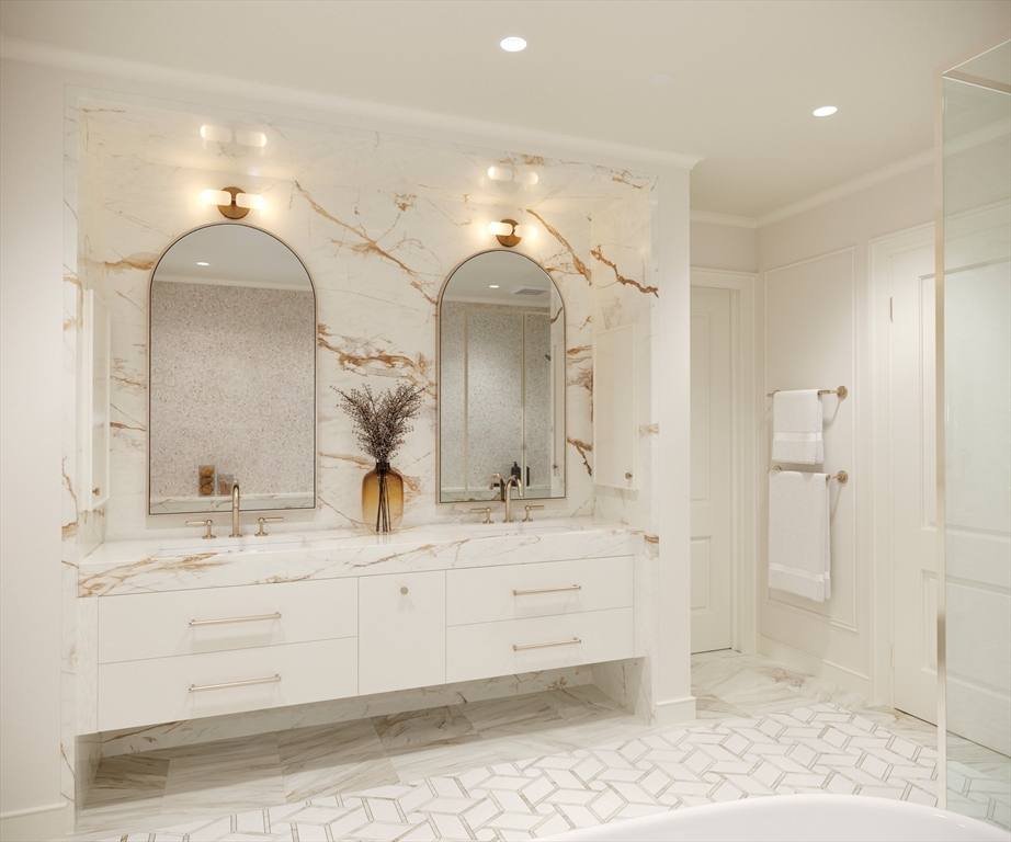 397 Commonwealth Avenue, Unit 3 Boston, MA 02215 - Photo 6 of 7 a bathroom with a double vanity sink and a mirror
