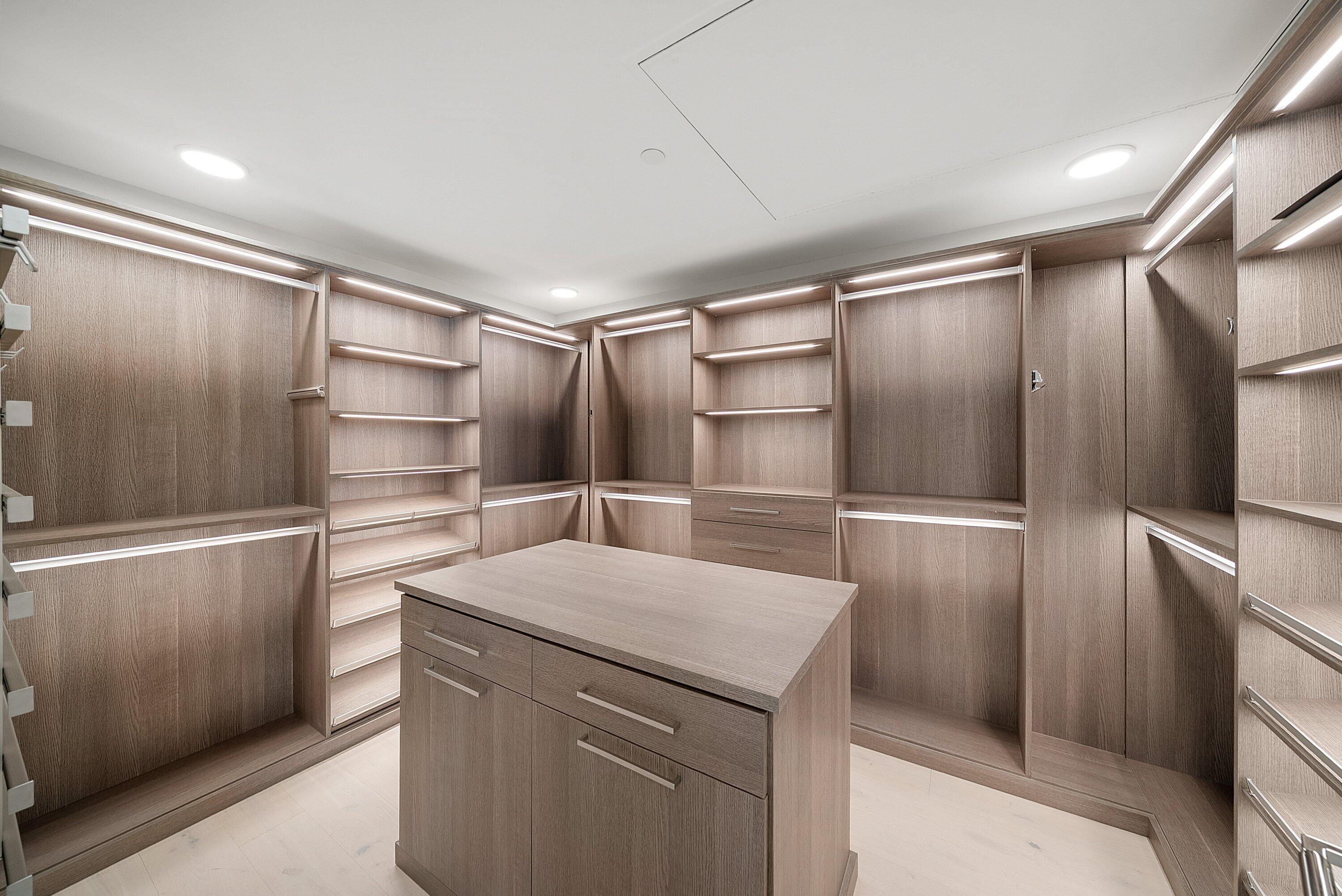 3550 South Ocean Boulevard, Unit 7C South Palm Beach, FL 33480 - Photo 22 of 66 a kitchen with a refrigerator and countertop