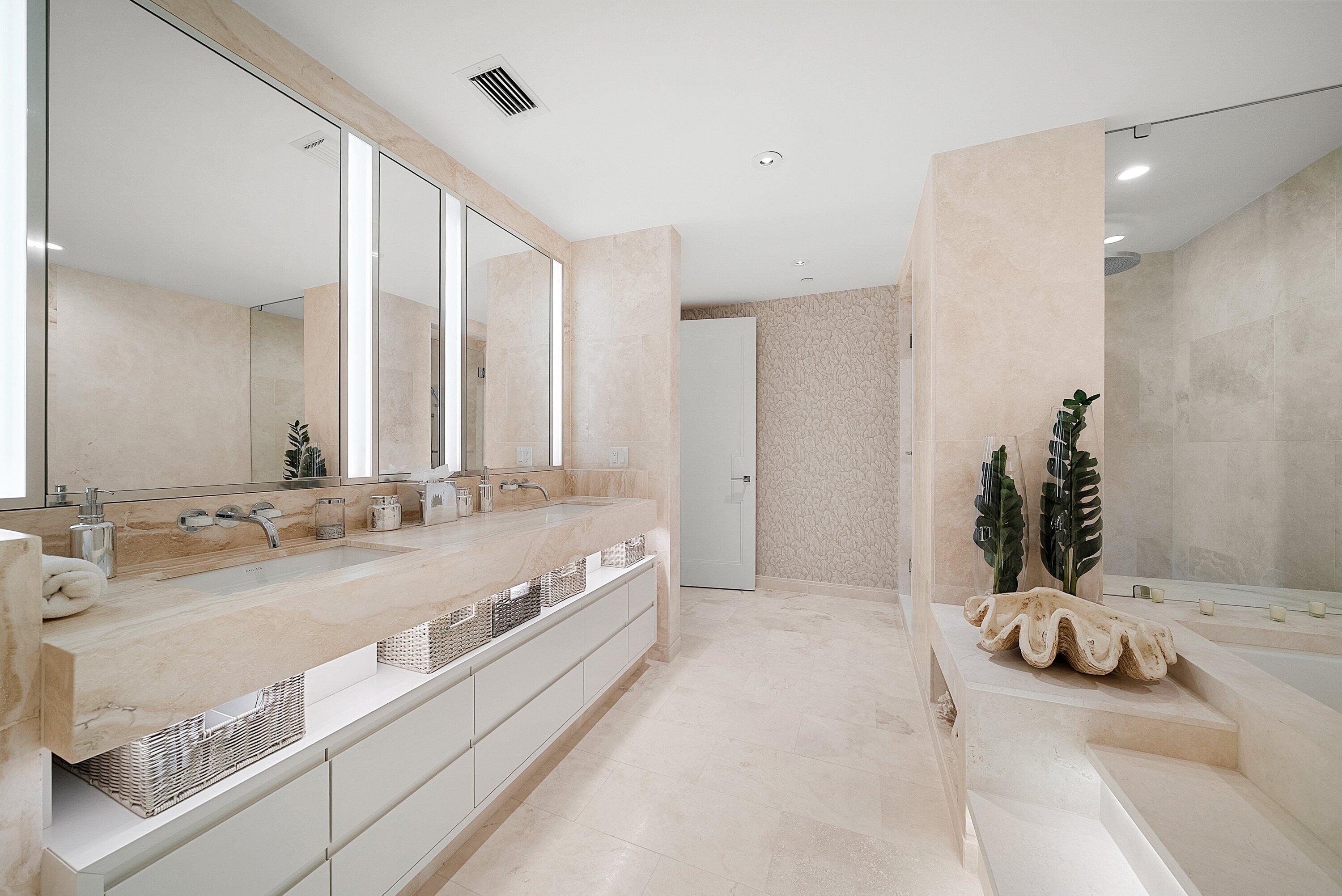 3550 South Ocean Boulevard, Unit 7C South Palm Beach, FL 33480 - Photo 23 of 66 a spacious bathroom with a double vanity sink and a large mirror