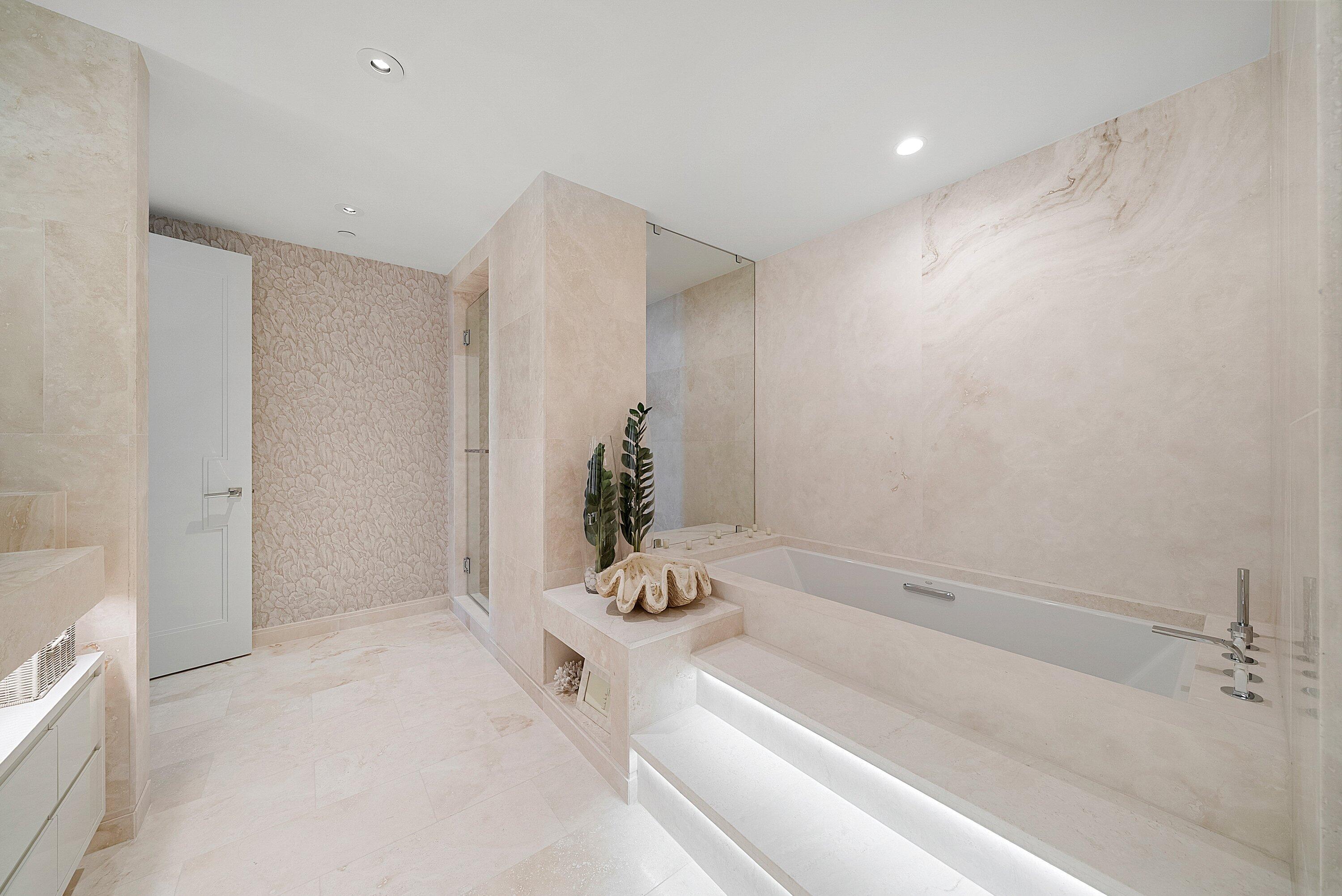 3550 South Ocean Boulevard, Unit 7C South Palm Beach, FL 33480 - Photo 26 of 66 a bathroom with a bathtub and shower