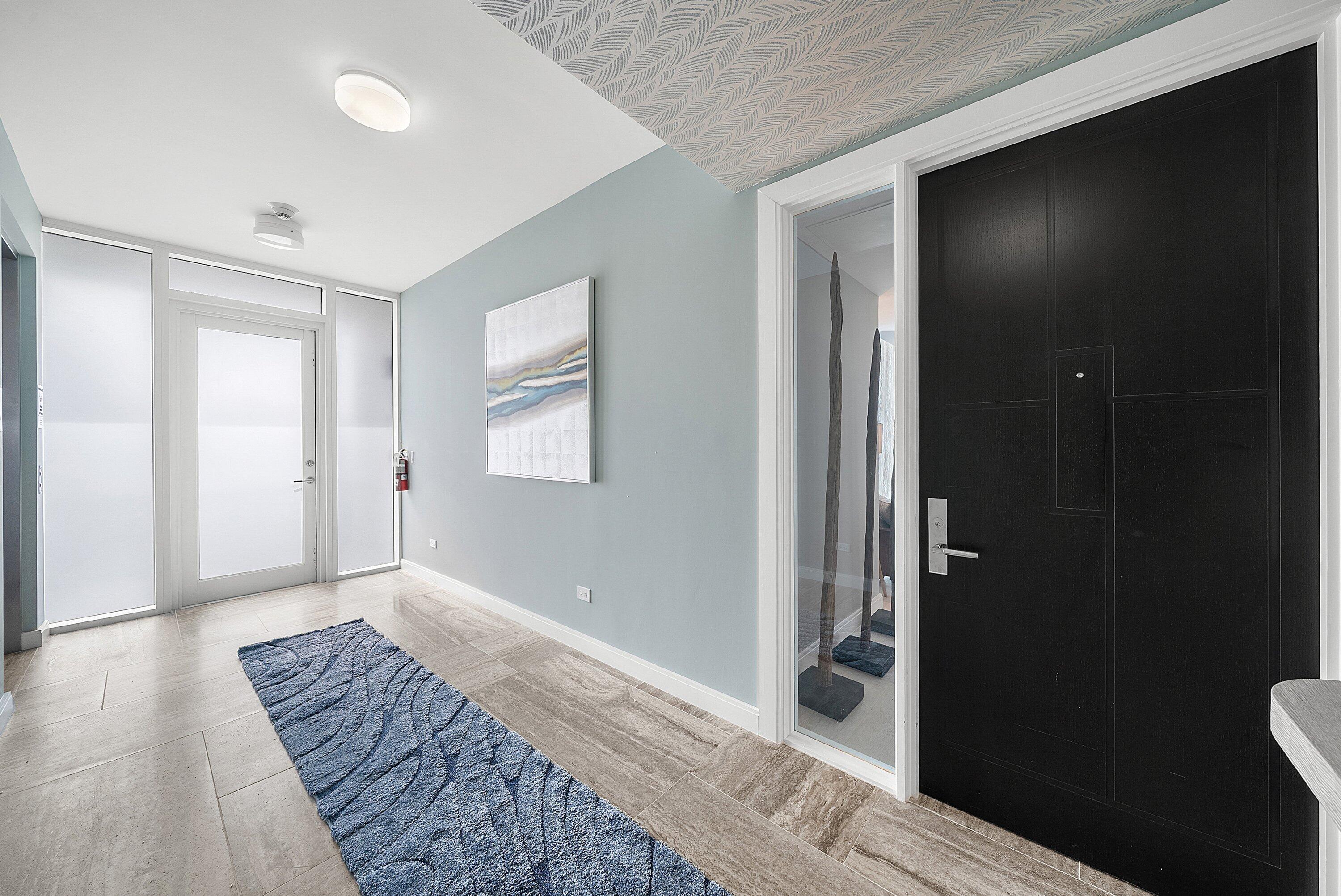 3550 South Ocean Boulevard, Unit 7C South Palm Beach, FL 33480 - Photo 4 of 66 Foyer