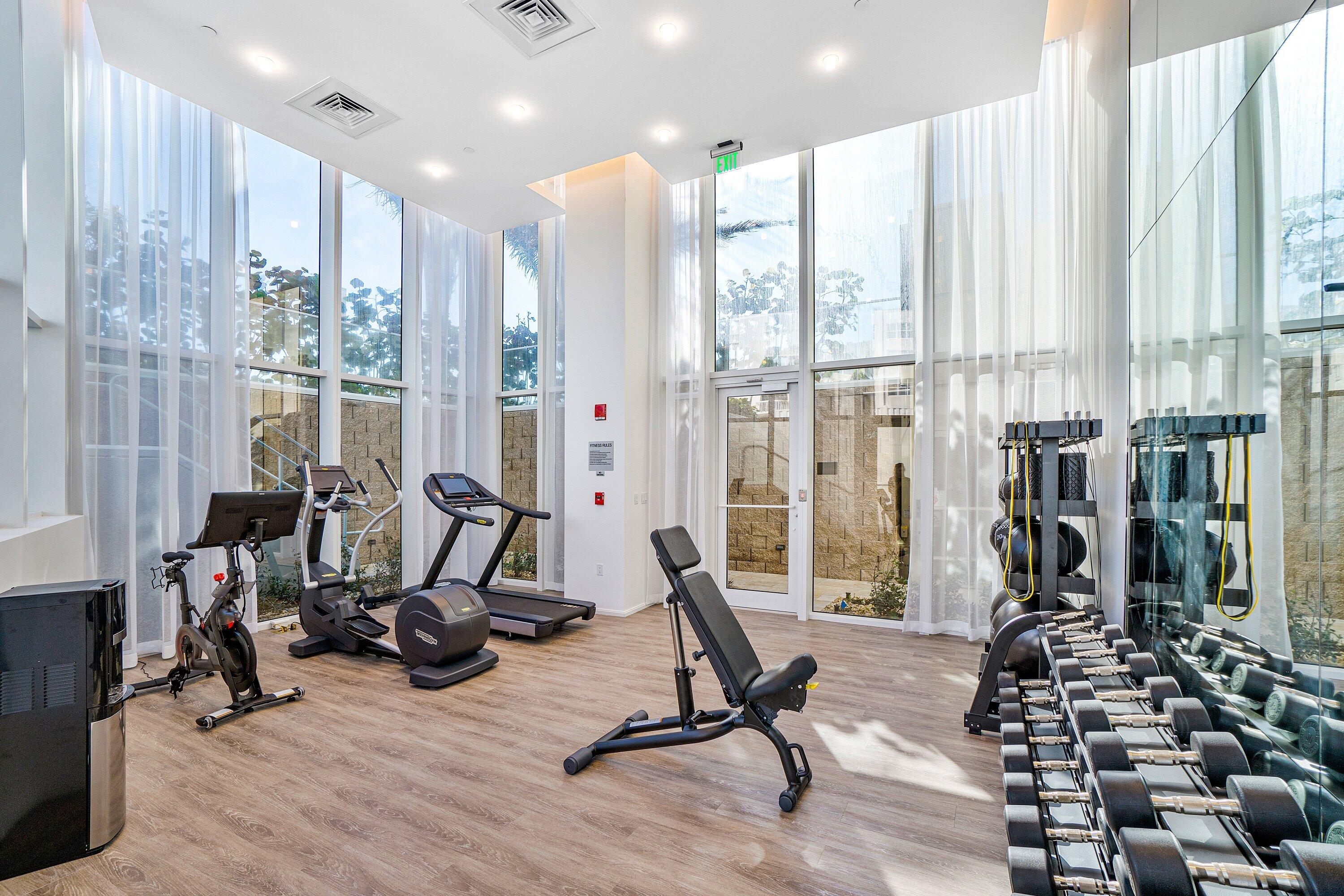 3550 South Ocean Boulevard, Unit 7C South Palm Beach, FL 33480 - Photo 52 of 66 a view of a room with gym equipment