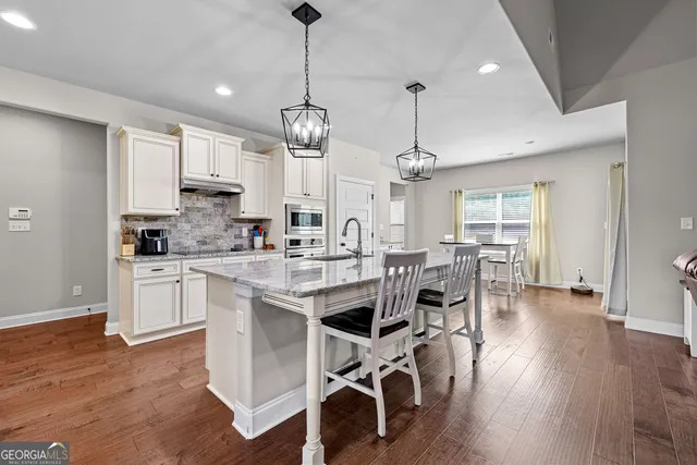 a view of kitchen and windows