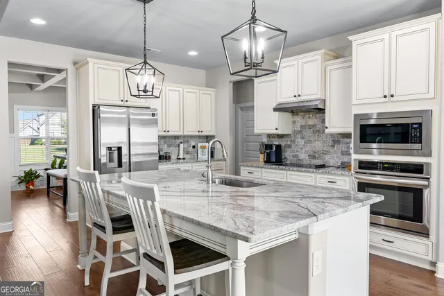 a view of kitchen and sink
