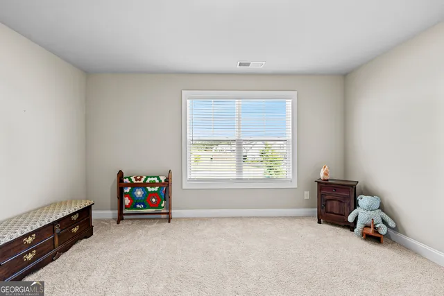 a view of a room with baby toys