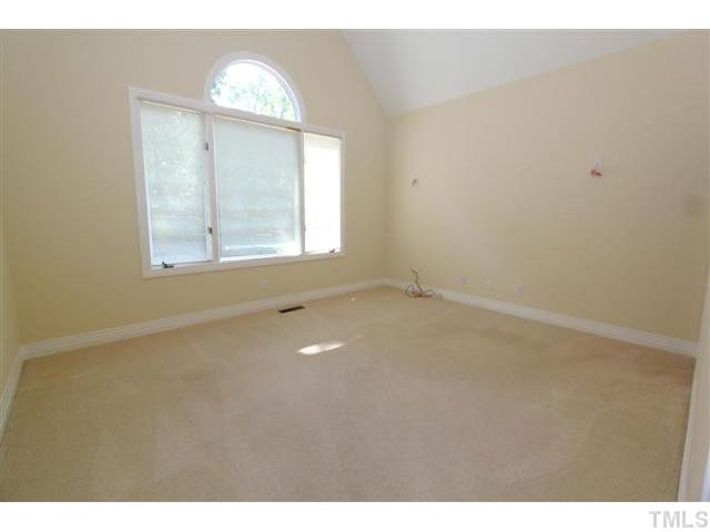 1433 Adams Mountain Road Raleigh, NC 27614 - Photo 13 of 25 a view of an empty room with a window