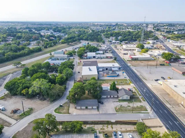 an aerial view of a house with a garden