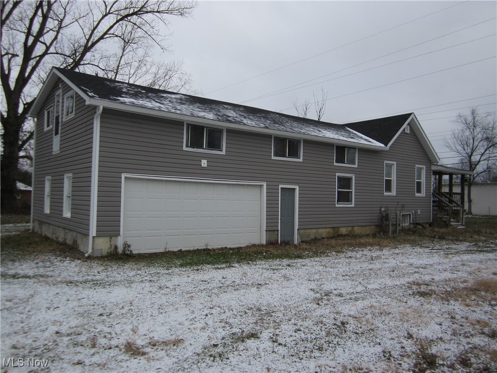 10464 Lagrange Road Elyria, OH 44035 - Photo 3 of 28 Back of property featuring a garage