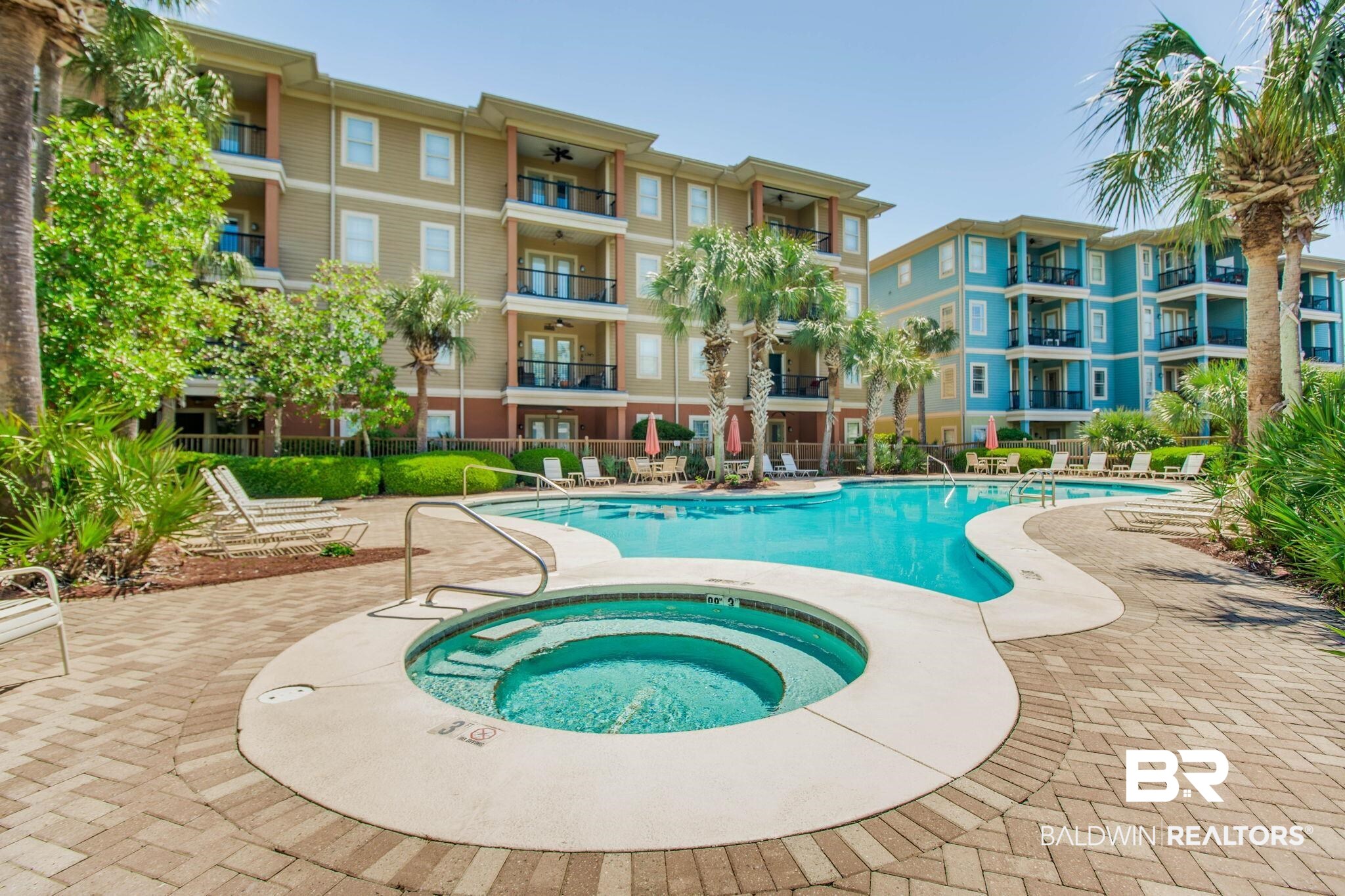 1430 Regency Road, Unit I201 Gulf Shores, AL 36542 - Photo 23 of 34 View of swimming pool with a hot tub and a patio area