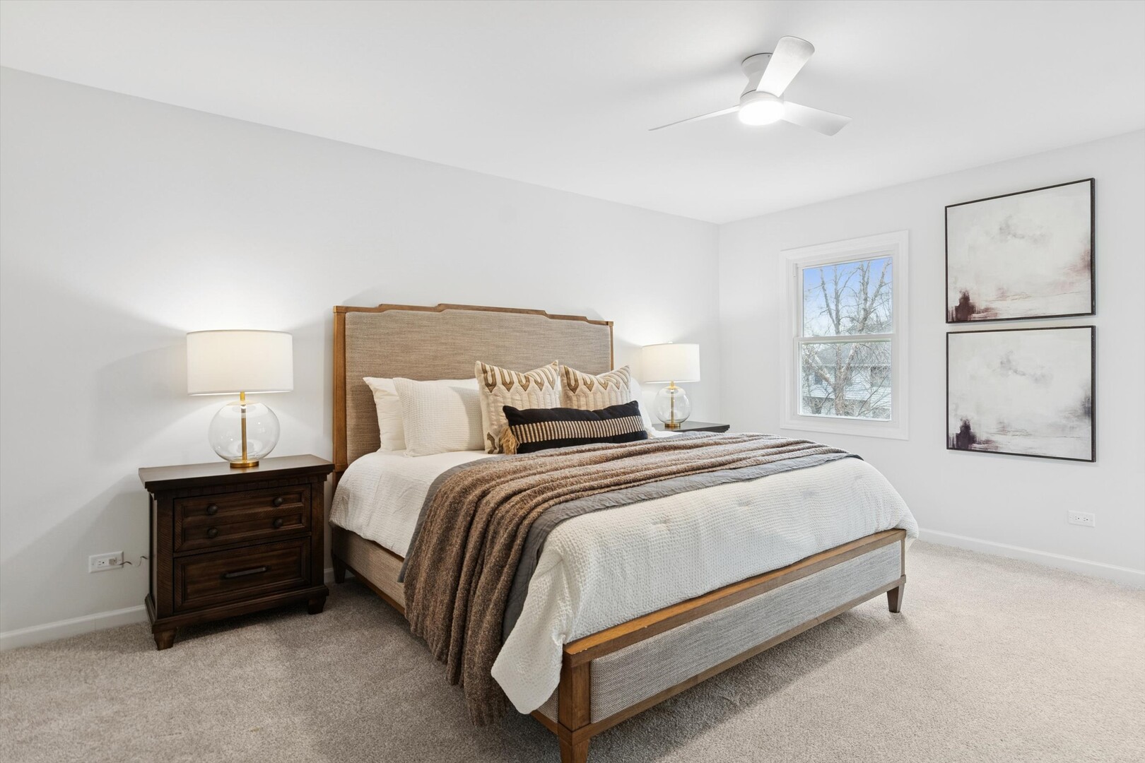 731 South River Road Naperville, IL 60540 - Photo 12 of 27 a bed room with a bed and a lamp