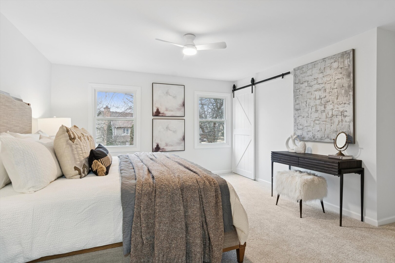 731 South River Road Naperville, IL 60540 - Photo 13 of 27 a bedroom with a bed and a table