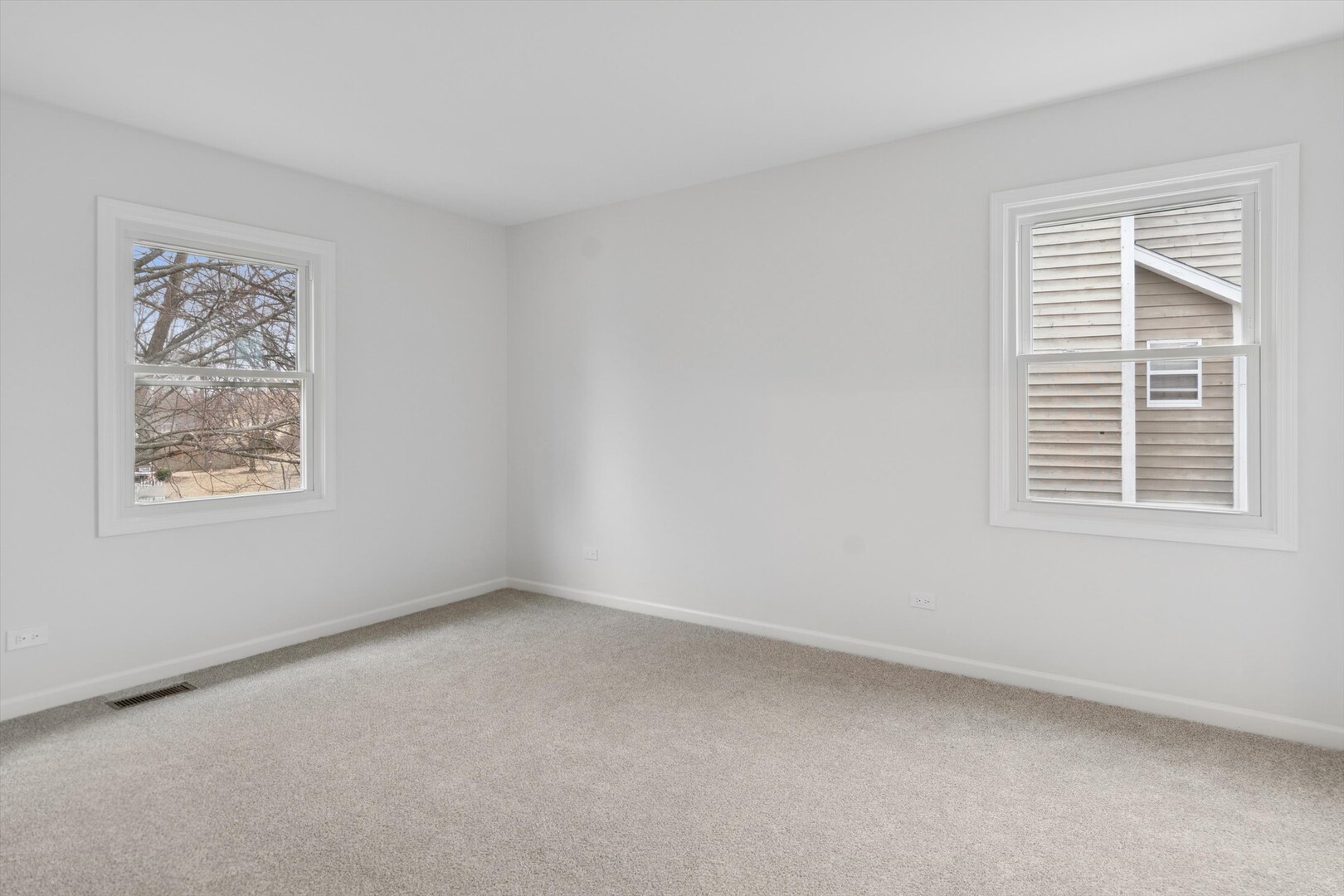 731 South River Road Naperville, IL 60540 - Photo 18 of 27 a view of an empty room with a window