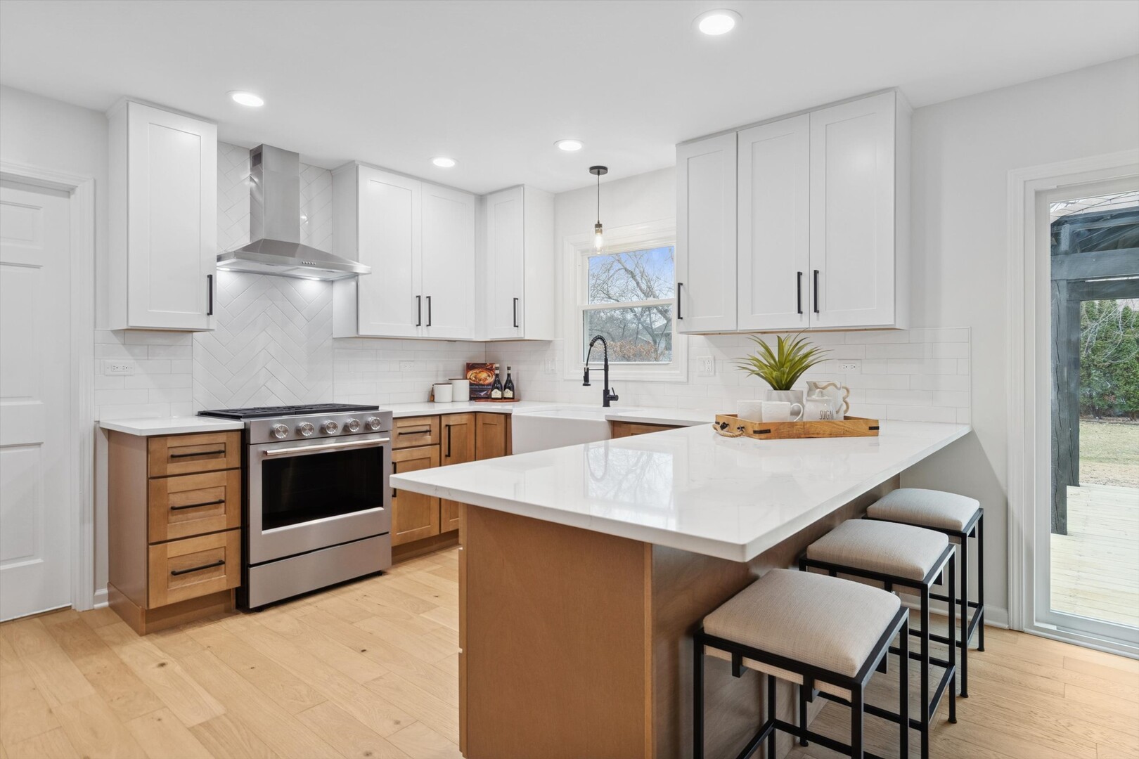 731 South River Road Naperville, IL 60540 - Photo 2 of 27 a kitchen with a stove a sink and a refrigerator