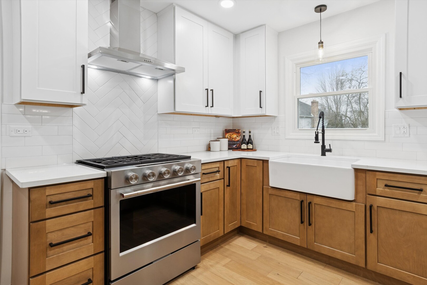 731 South River Road Naperville, IL 60540 - Photo 4 of 27 a kitchen with cabinets appliances and a sink