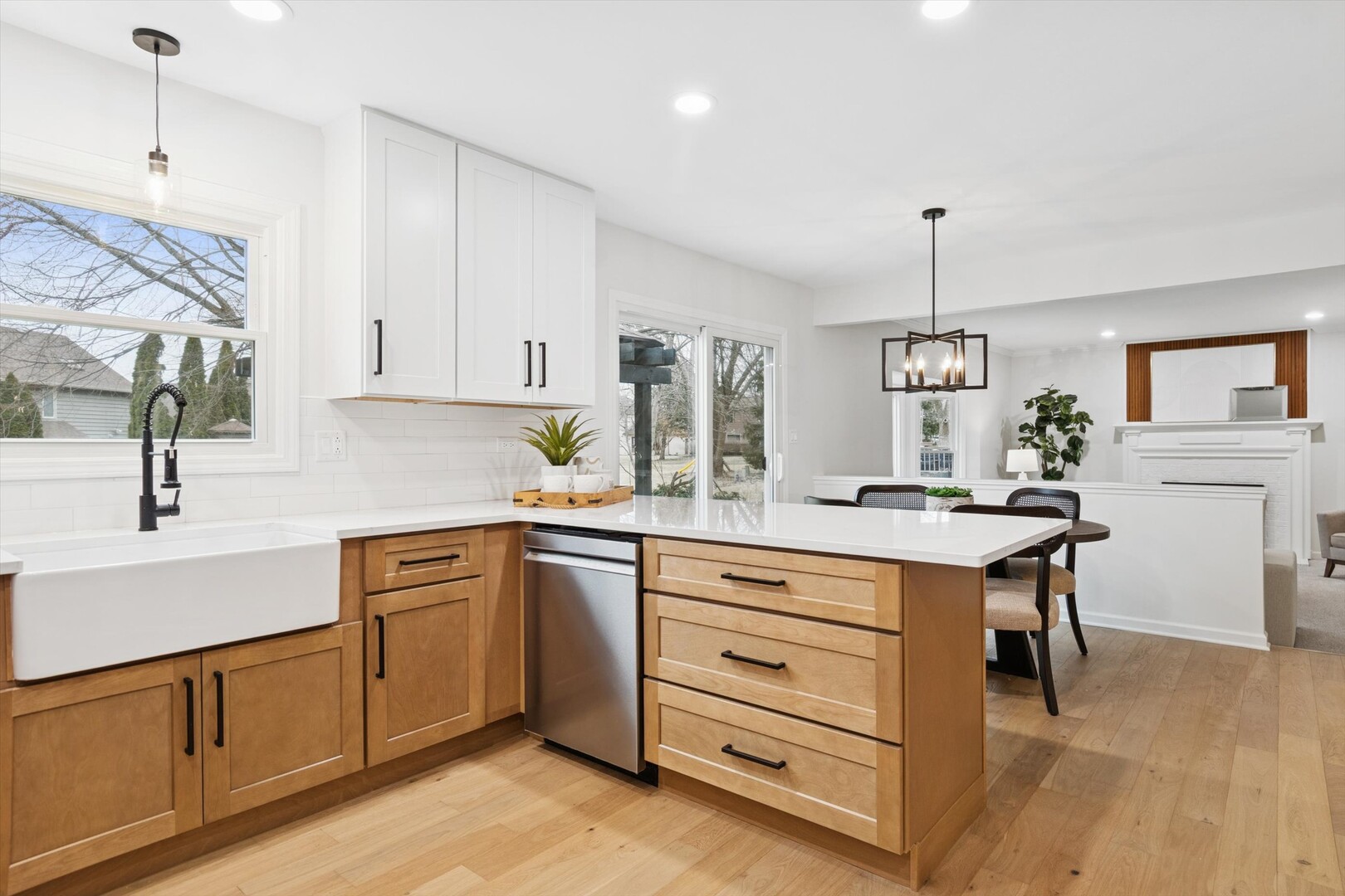 731 South River Road Naperville, IL 60540 - Photo 5 of 27 a kitchen with granite countertop a sink and cabinets